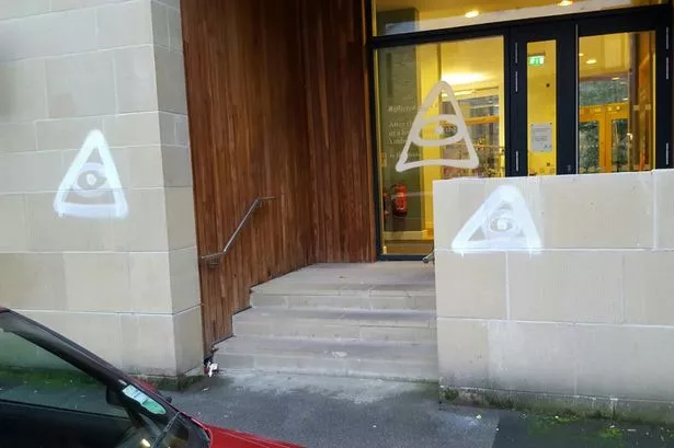 Vandals target Hebden Bridge town hall by graffiti-ing the illuminati symbol