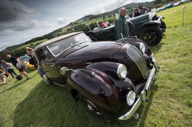 Classic cars and the Yorkshire Air Ambulance in Holmfirth