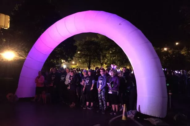Over 1,000 people - and a few dogs - take part in hospice's midnight walk