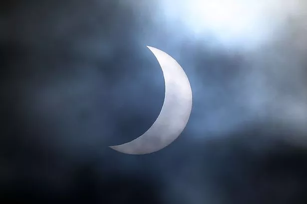 Partial solar eclipse can be seen over Huddersfield TONIGHT - if the clouds stay away